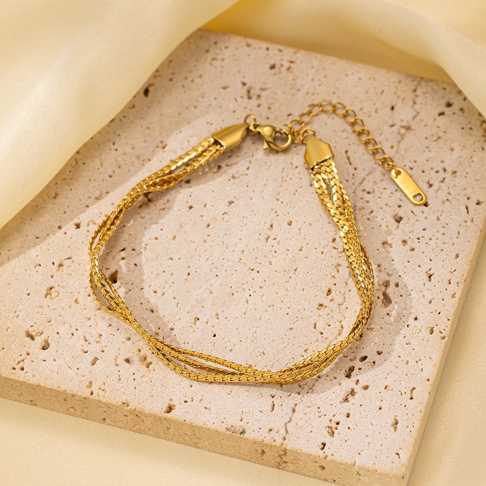 Aurion Strand Bracelet — 18K gold plated stainless steel strand bracelet by Glitze Accessories Pakistan