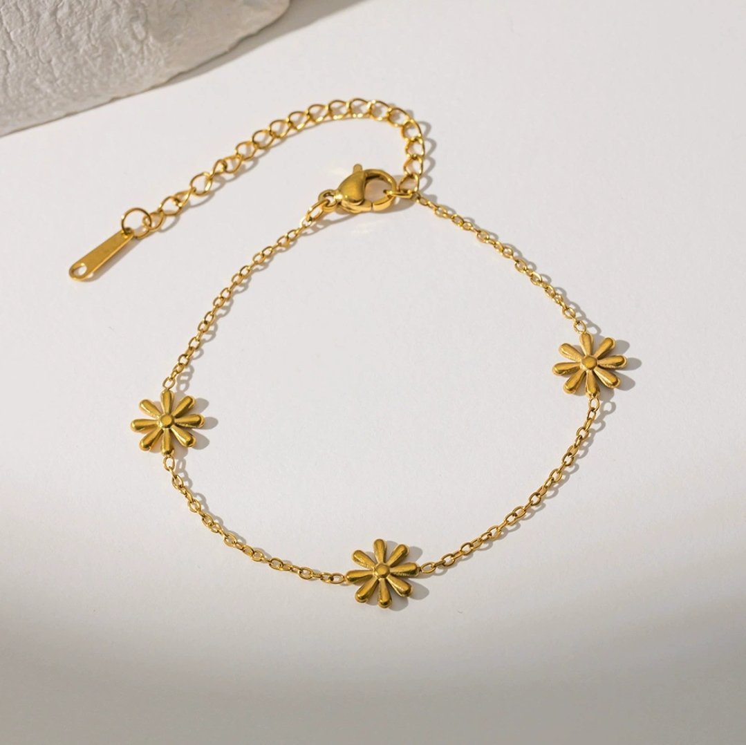 Orchia Bracelet — 18K gold plated stainless steel orchid-inspired bracelet by Glitze Accessories Pakistan