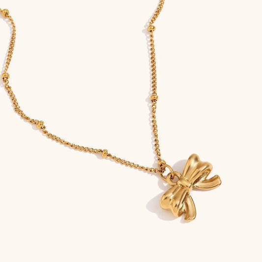 Glitze Accessories Zari gold bow necklace — tarnish-free, waterproof, hypoallergenic jewellery Pakistan