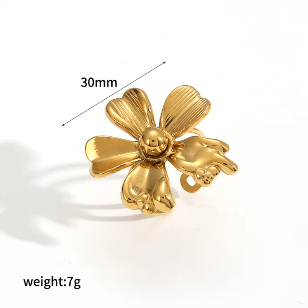Simple marigold flower accessory by Glitze Accessories featuring vibrant orange petals and detailed design.