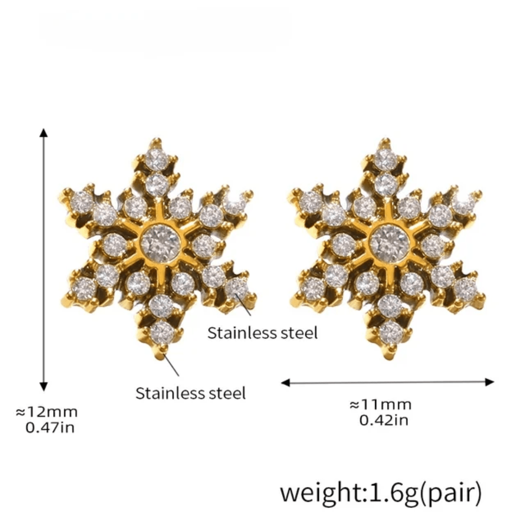 Silver snowflake earrings by Glitze Accessories featuring intricate, shimmering snowflake designs for winter elegance.