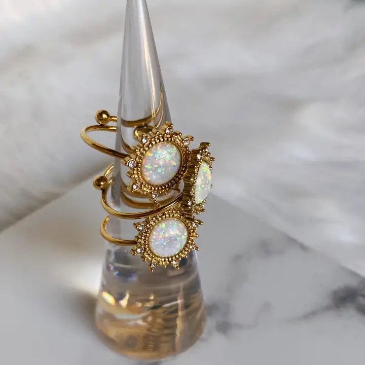Glitze Accessories Solaria jewelry piece featuring intricate design and shiny details on a neutral background.