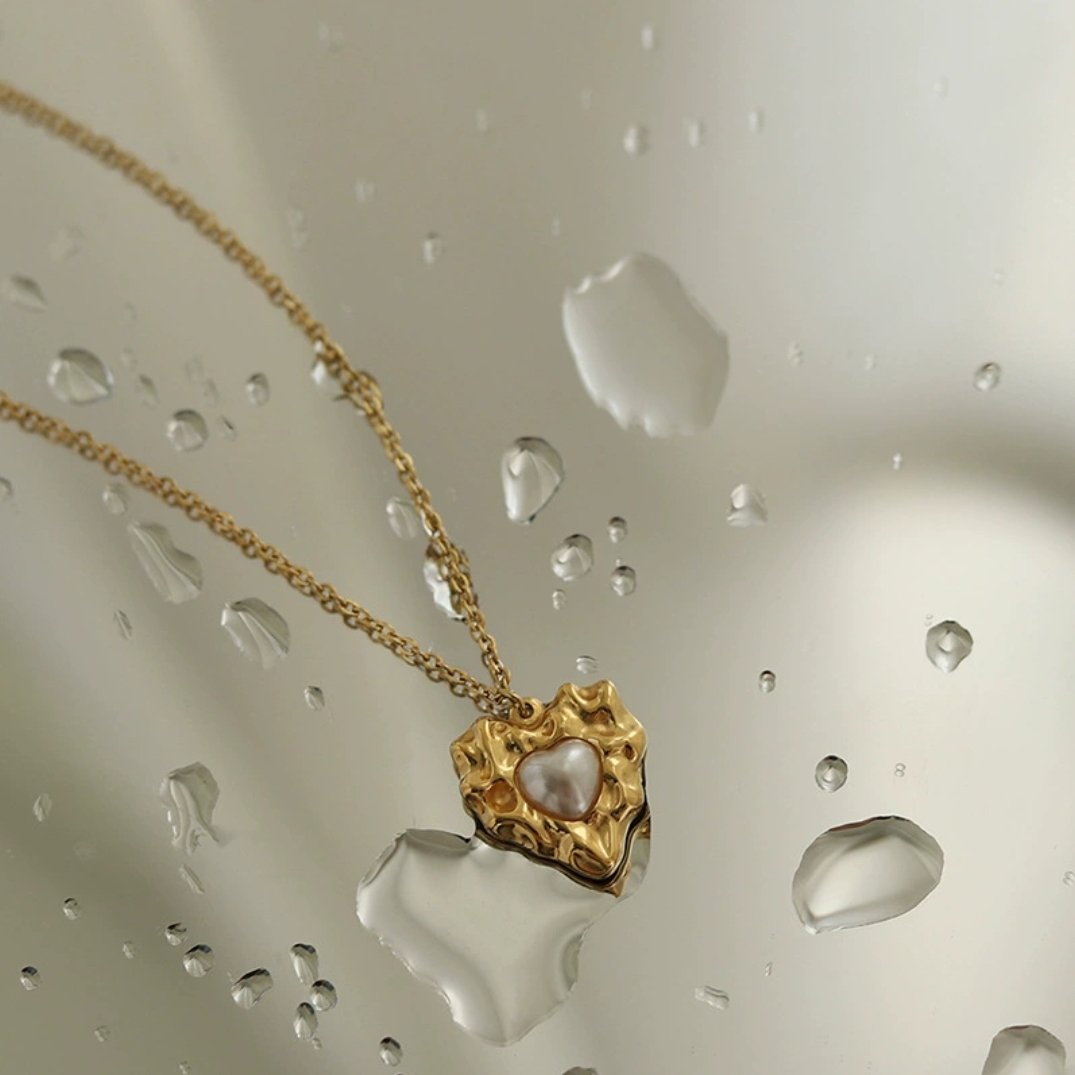 Celeste Heart Necklace on neck — waterproof hypoallergenic gold heart necklace | Glitze Accessories