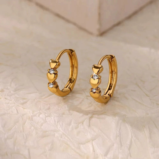 Heartelle Earrings — 18K gold plated stainless steel heart earrings by Glitze Accessories Pakistan