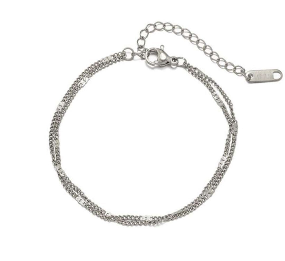 Simple silver jewelry piece by Glitze Accessories, showcasing a sleek and minimalist design with a polished finish.
