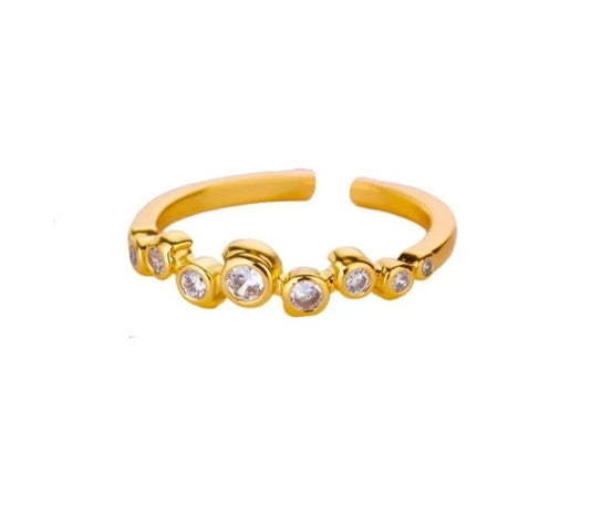 Glitze Accessories Droplet jewelry piece featuring a sleek, shimmering design with reflective surfaces.