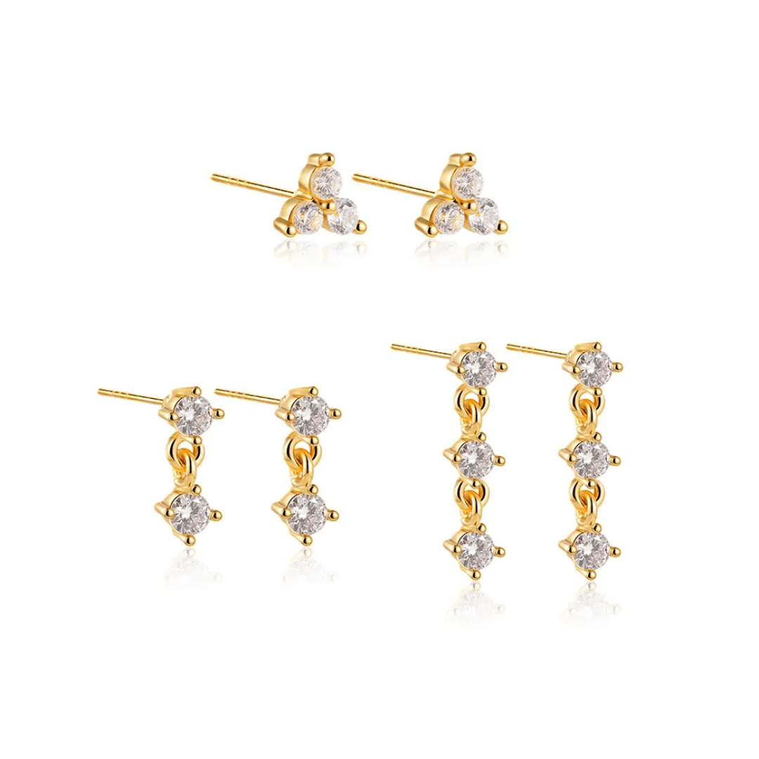 Glitze Accessories Mina Stack featuring layered metallic rings and minimalist design on a neutral background