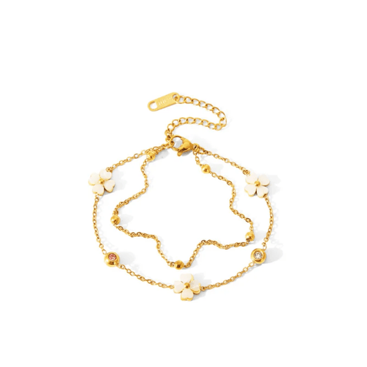 Simple Lily Bracelet by Glitze Accessories featuring delicate floral design on a sleek silver band.
