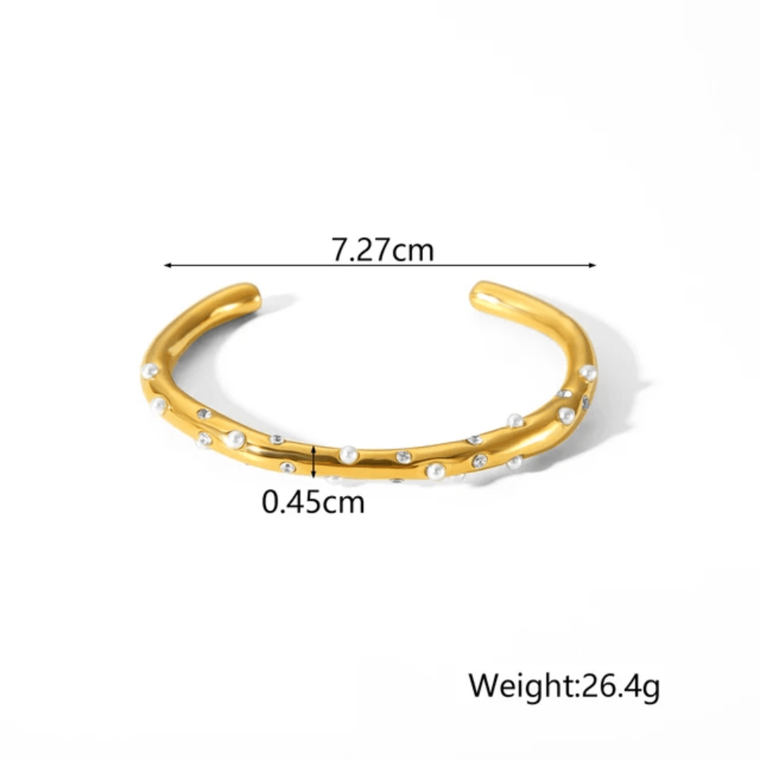 Simple gold-tone Orvee bracelet by Glitze Accessories featuring sleek, minimalist design with smooth finish.