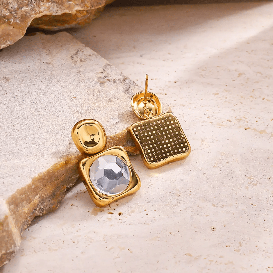Glitze Accessories Nebula jewelry piece featuring shimmering, colorful stones and intricate design.