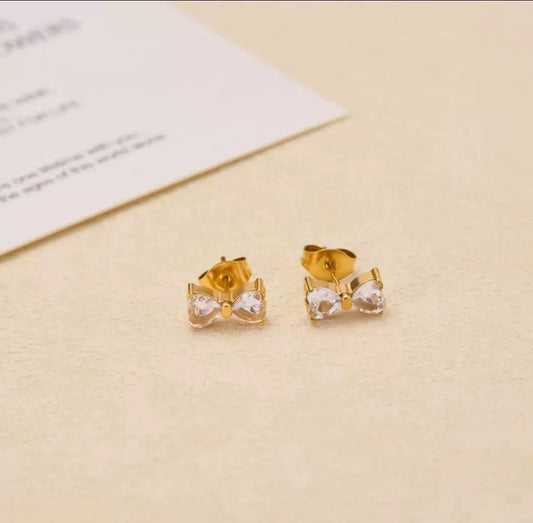 Seraphic Bow Earrings close-up — waterproof hypoallergenic gold bow earrings | Glitze Accessories