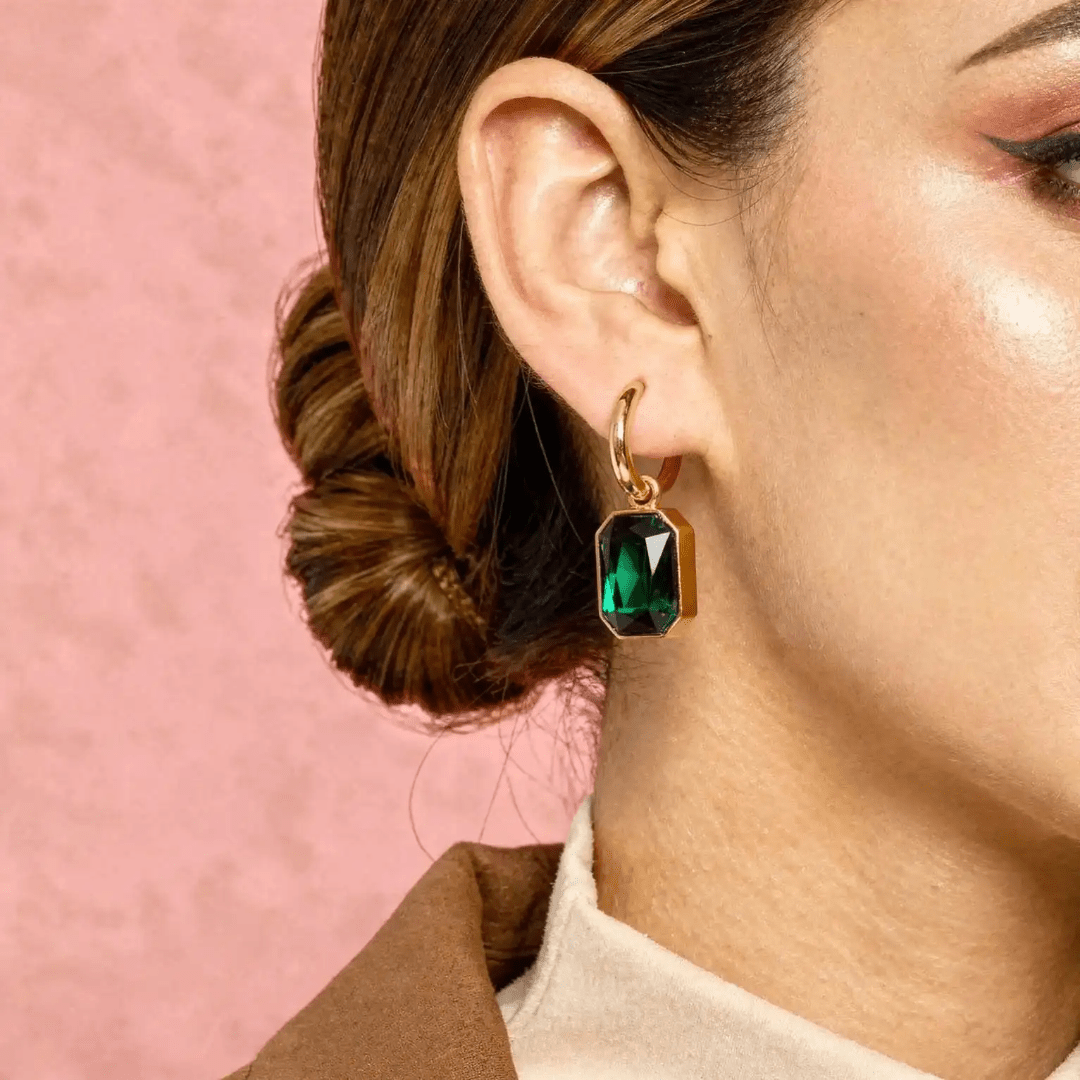 Green Gemma earrings by Glitze Accessories featuring sparkling gemstones and elegant dangle design.
