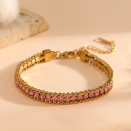 Ayleen Bracelet Pink close-up – pink crystal row on gold curb chain by Glitze Accessories