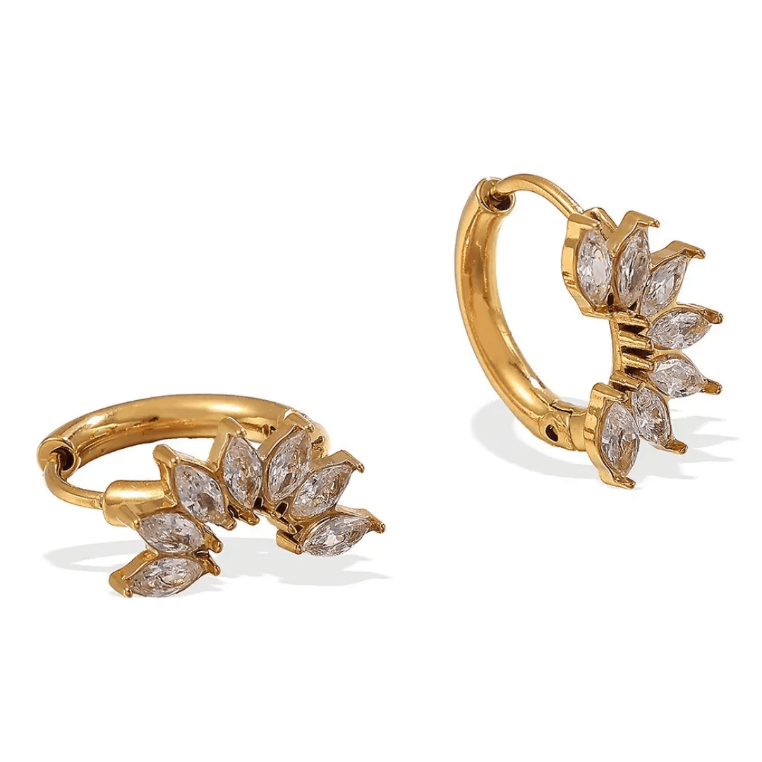 Glitze Accessories Allure Earrings featuring elegant gold hoops with sparkling gemstone accents on a white background.