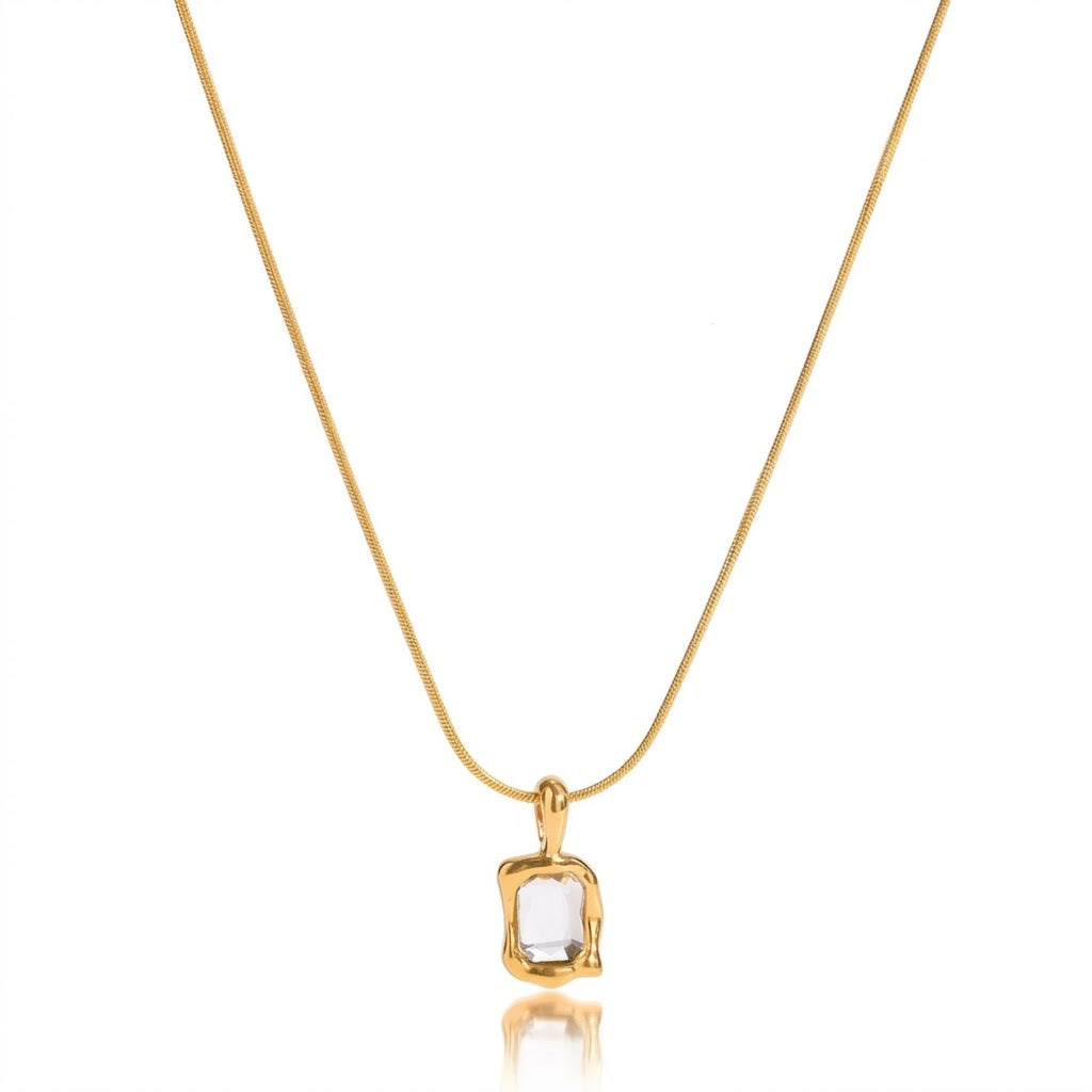 Eden Necklace White — clear crystal pendant on gold snake chain, 18K gold plated stainless steel | Glitze