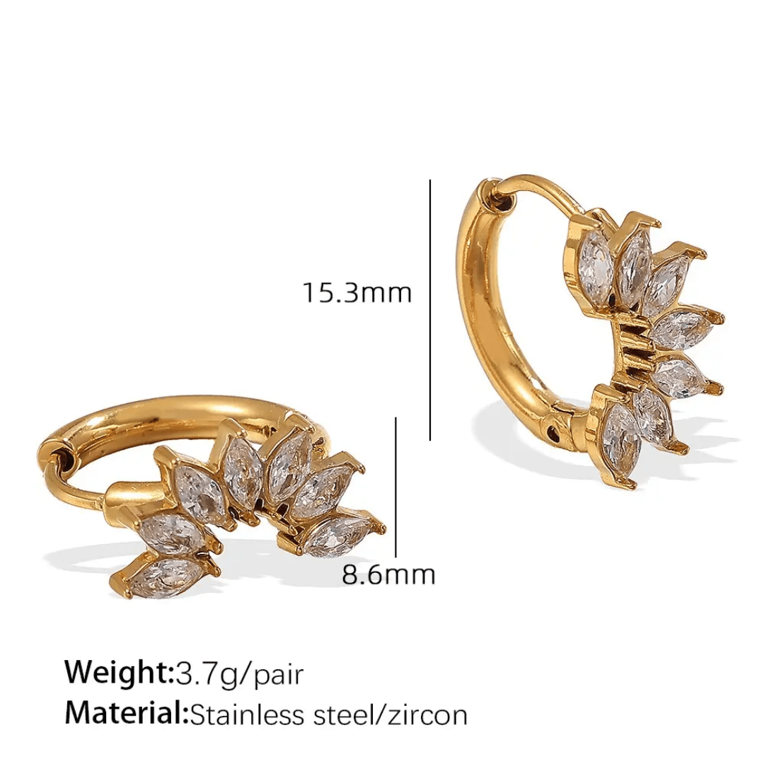 Glitze Accessories Allure Earrings featuring gold-tone hoops with delicate gemstone accents and elegant design.