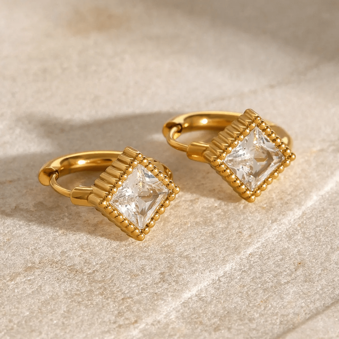 Glitze Accessories Quasar jewelry piece with shimmering design and intricate details displayed against a neutral background.