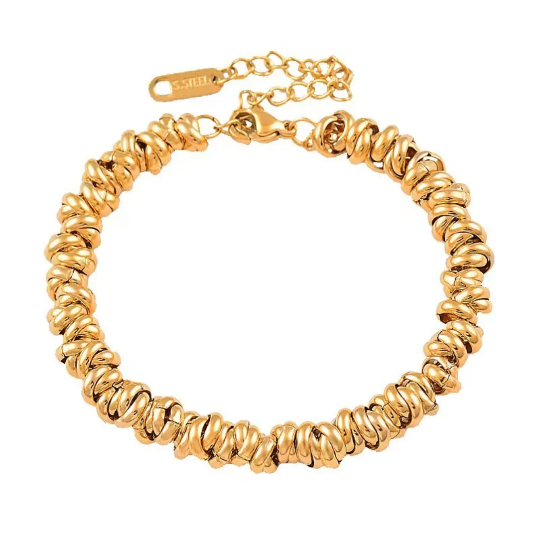 Glitze Accessories Sahara jewelry piece featuring intricate design and metallic finish, displayed on a neutral background.