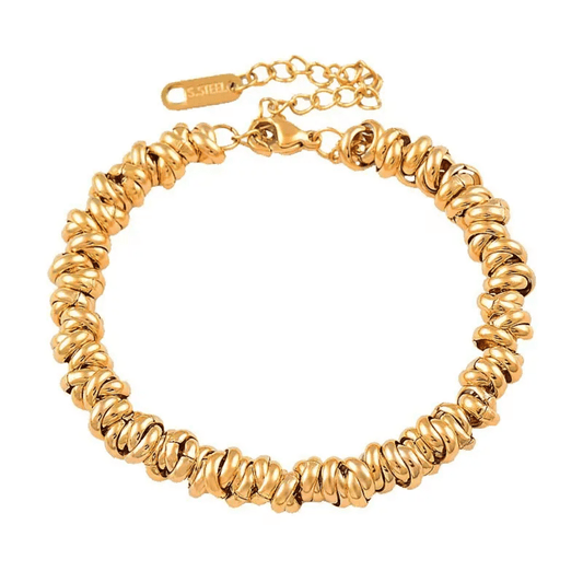 Glitze Accessories Sahara jewelry piece featuring intricate design and metallic finish, displayed on a neutral background.