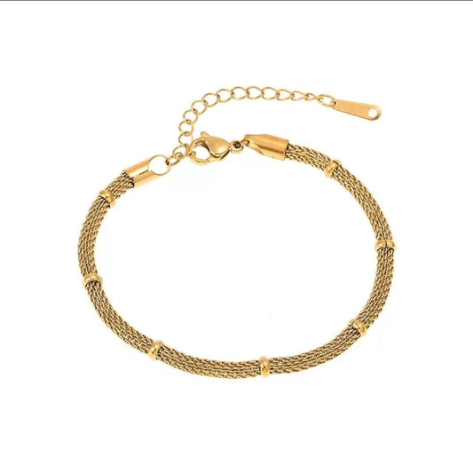 Slique by Glitze Accessories, a stylish jewelry piece featuring elegant design and sparkling accents, displayed on a white background.