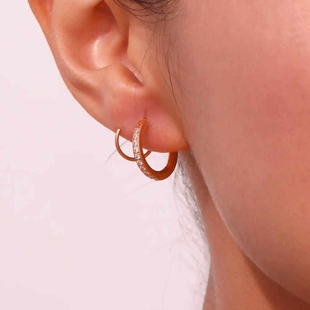 Gold loop earrings from Glitze Accessories featuring sleek, minimalist design with a polished finish.