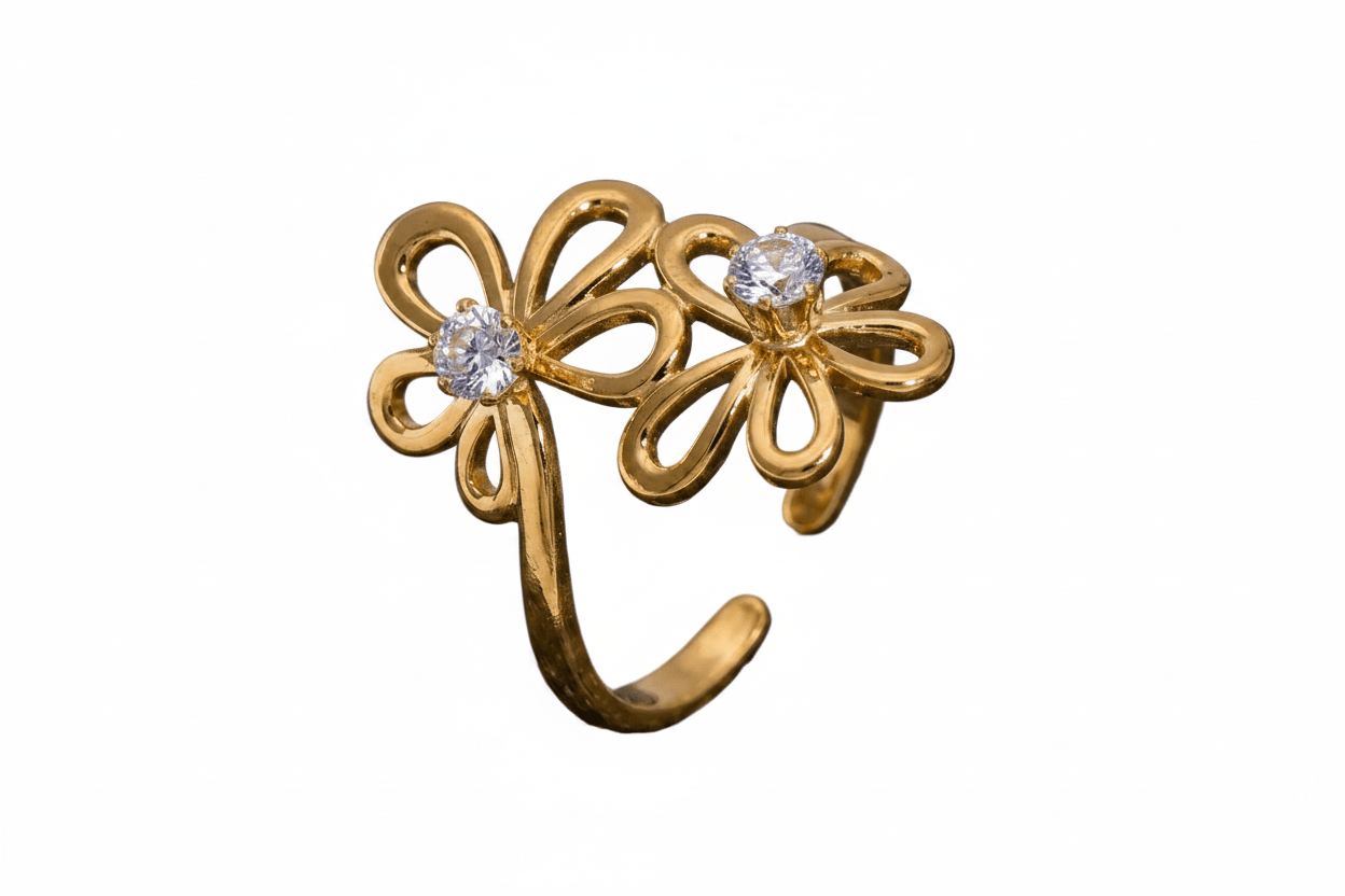Glitze Accessories Ether jewelry piece featuring intricate design and metallic finish, displayed on a neutral background.