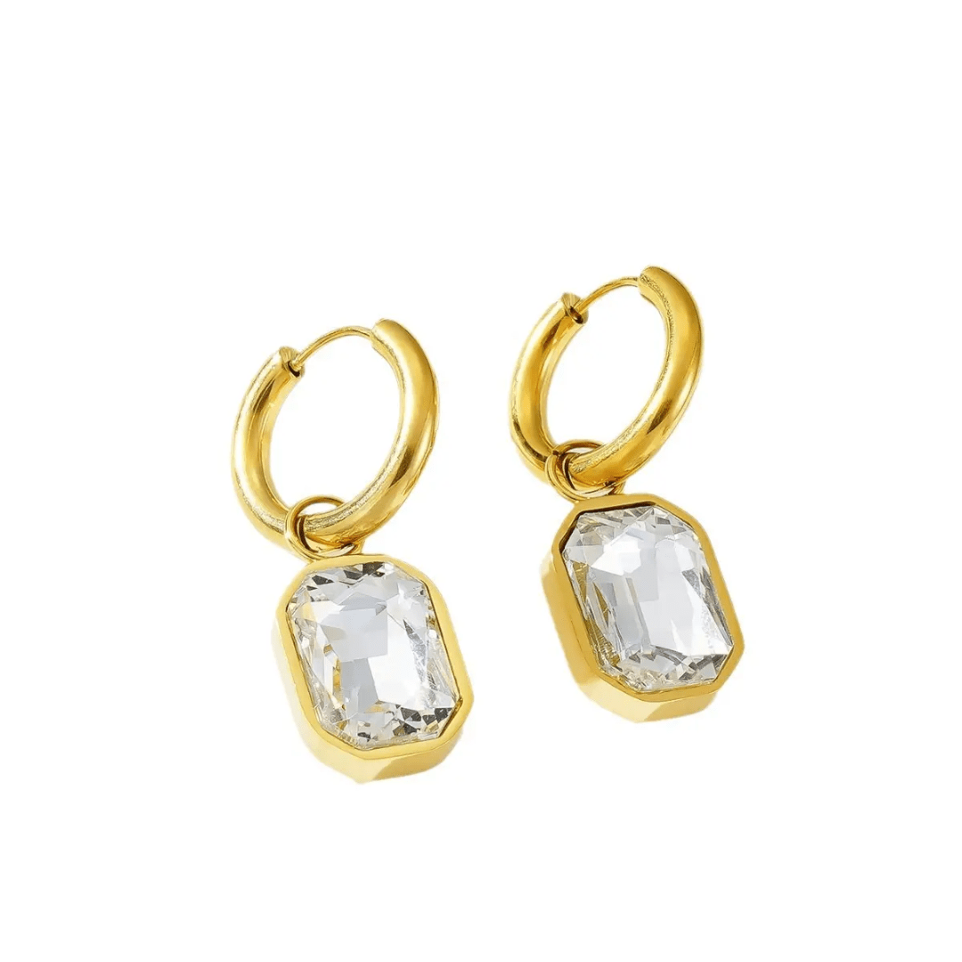 White Gemma earrings by Glitze Accessories featuring elegant, sparkling gemstone designs on lightweight earrings.
