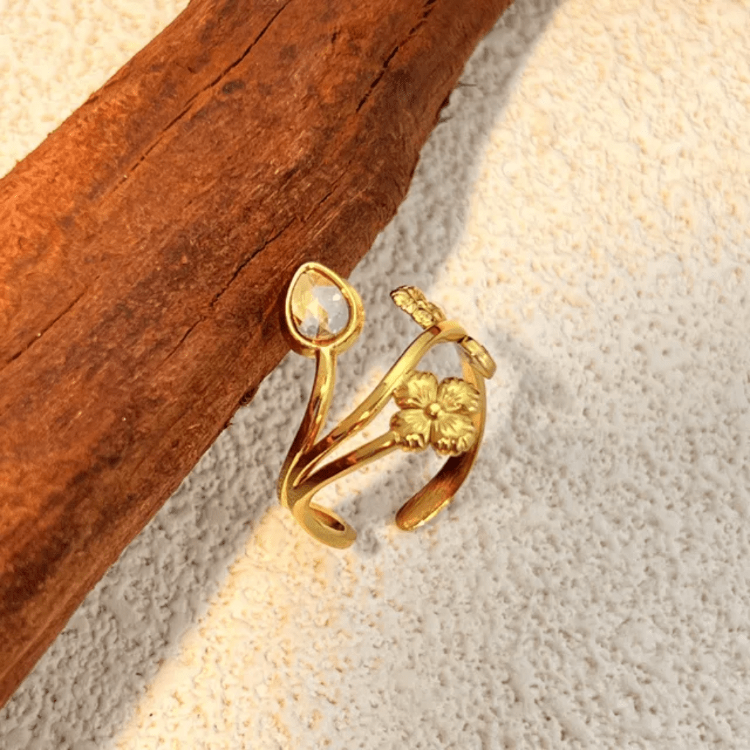 Glitze Accessories Stella jewelry piece with intricate design and shiny finish, displayed on a neutral background.
