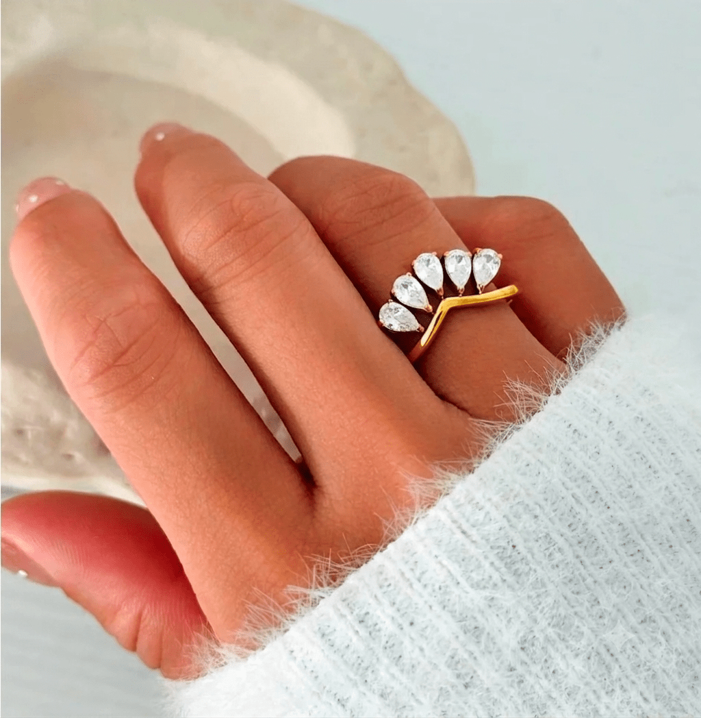 Glitze Accessories Starfall Ring with adjustable band, featuring a star design and sparkling gemstone details.