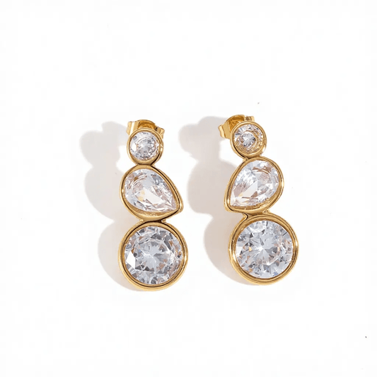 Glitze Accessories Grace earrings featuring elegant design with sparkling gemstones and silver-tone metal.