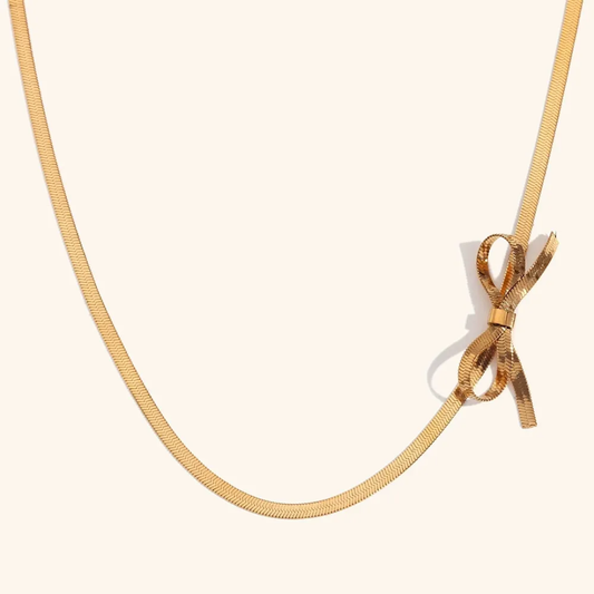 Bow Choker Necklace close-up — waterproof hypoallergenic gold choker | Glitze Accessories