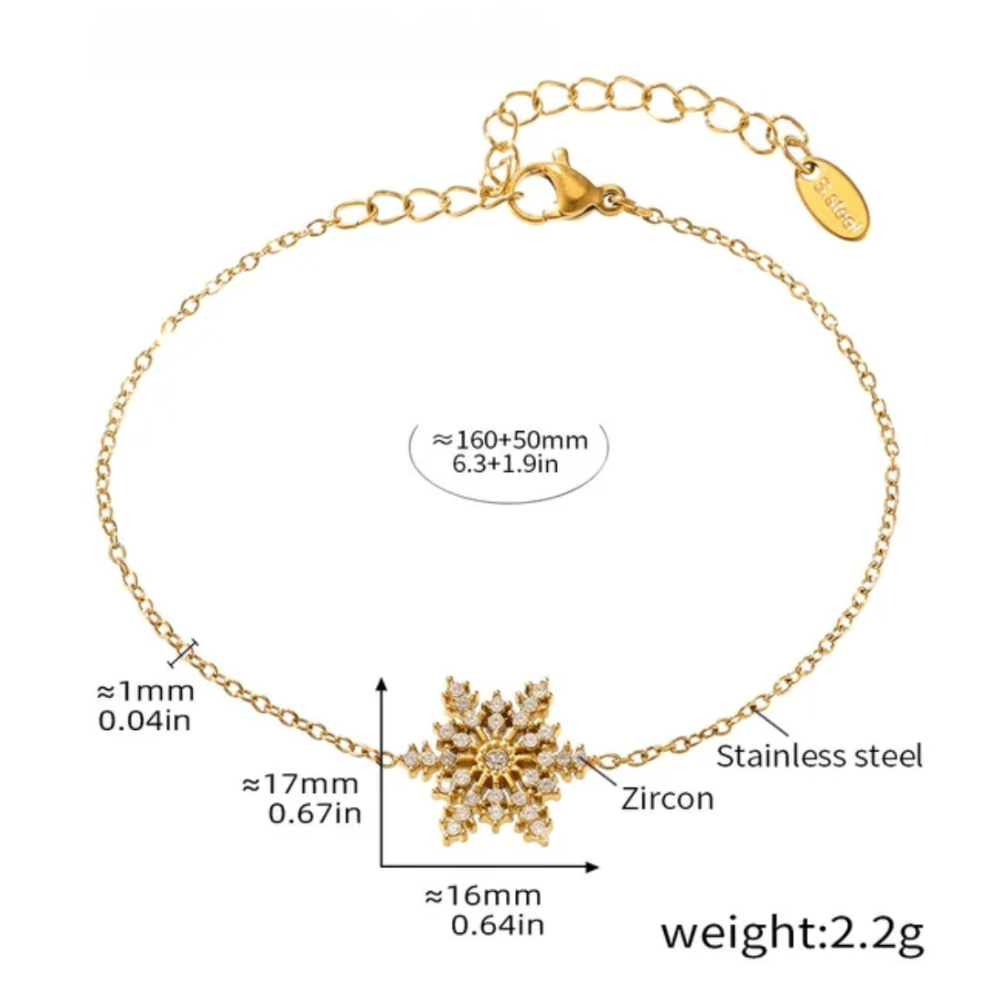Silver snowflake bracelet by Glitze Accessories featuring delicate snowflake charms on a sleek chain.