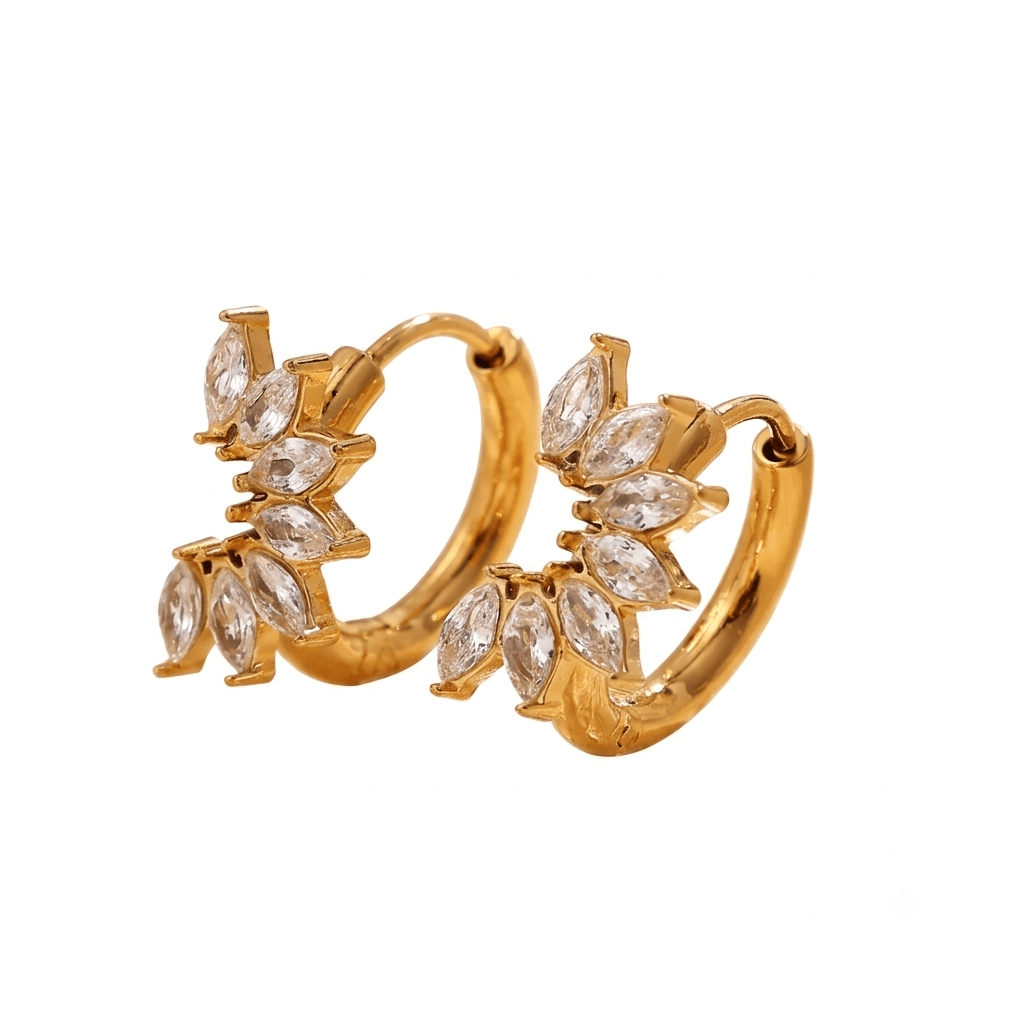 Glitze Accessories Allure Earrings featuring shimmering silver hoops with intricate detailing on a white background