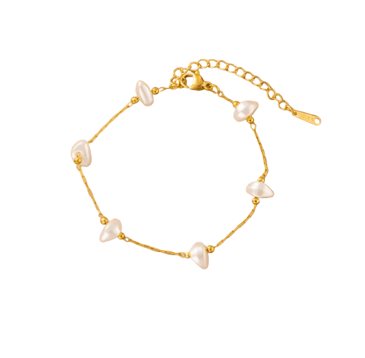 Kyra jewelry piece by Glitze Accessories featuring intricate design and shimmering details on a neutral background.
