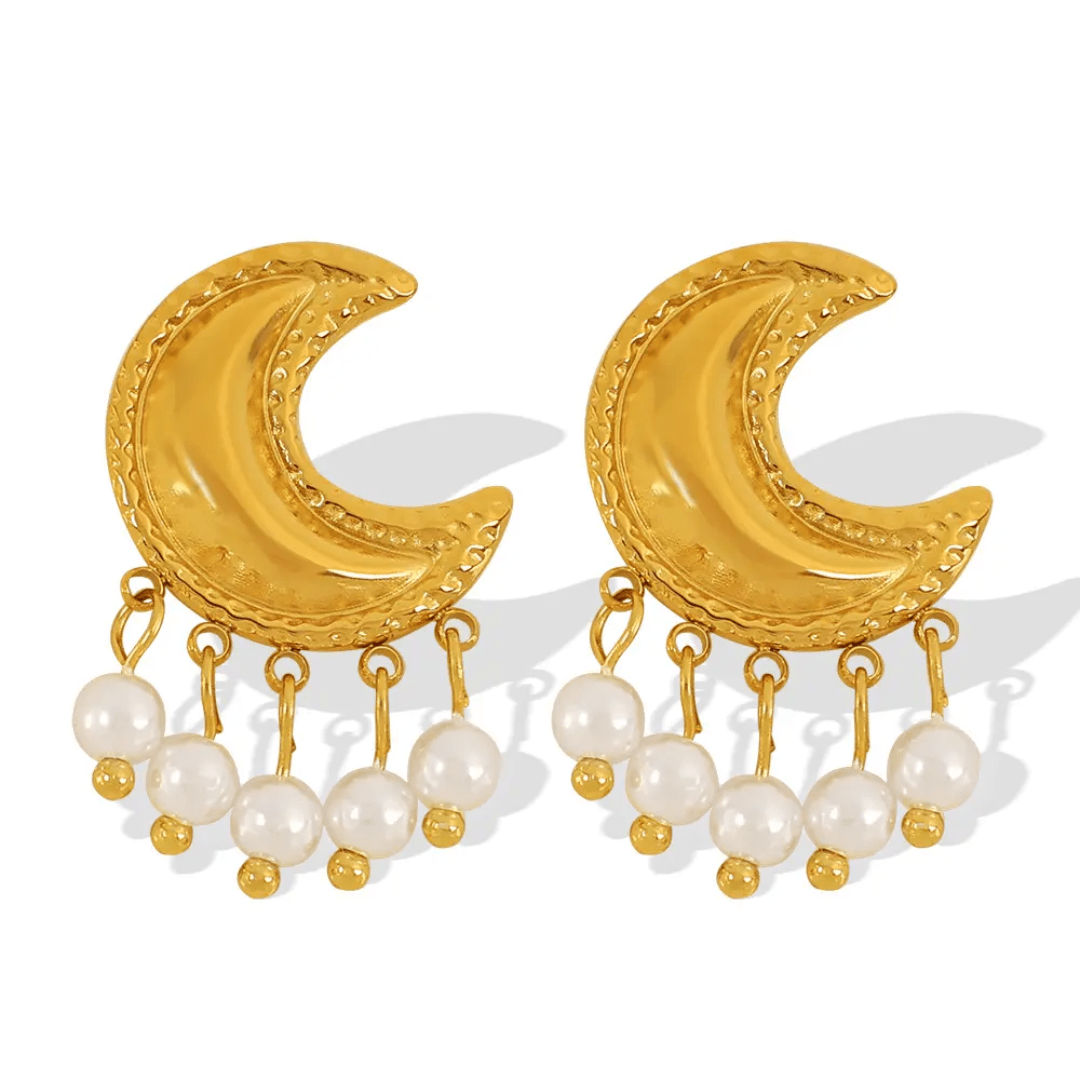 Glitze Accessories Crescent-shaped jewelry piece with intricate design, showcasing shiny silver finish and detailed craftsmanship.