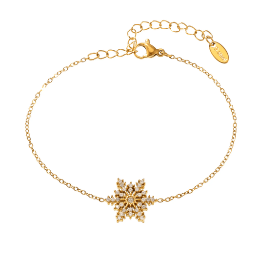 Silver snowflake bracelet by Glitze Accessories featuring delicate snowflake charms on a fine chain.